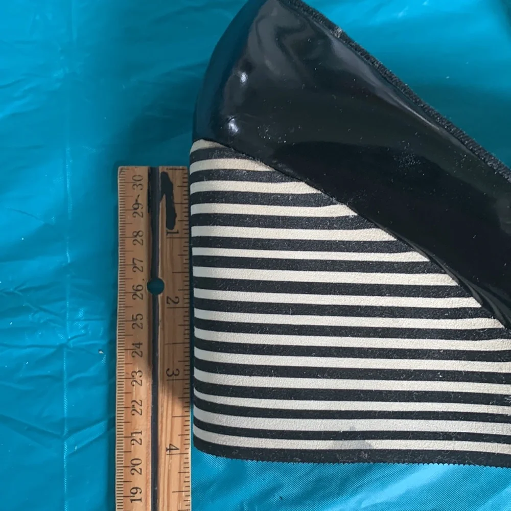 Gently worn Michael Kors Adlai’s Black and Cream Strip Wedge Shoes.